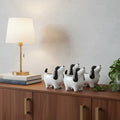 Set of Four Black And White Polyresin Dog Planters