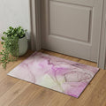 Pink And Ivory Abstract Washable Area Rug With UV Protection