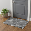 Black And Ivory Geometric Washable Area Rug With UV Protection