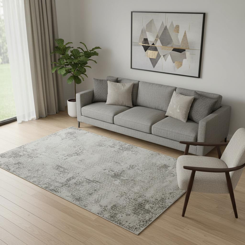 5' X 8' Gray And White Abstract Distressed Area Rug With Fringe