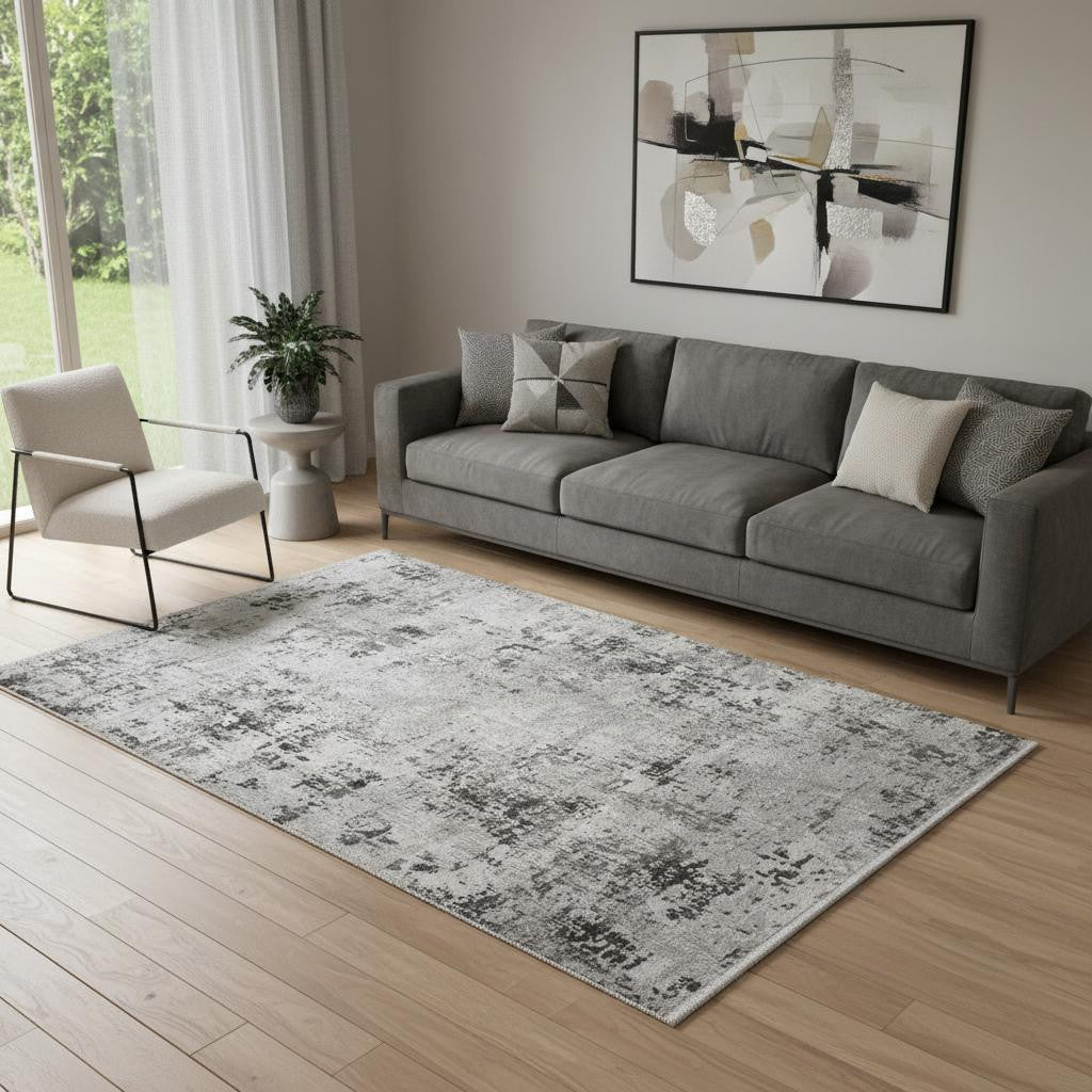 5' X 8' Gray And White Abstract Distressed Area Rug With Fringe