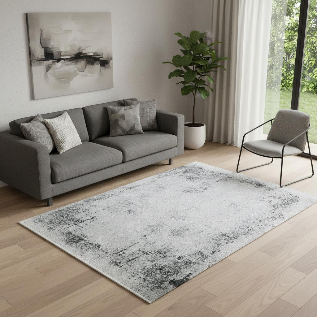 5' X 8' Gray And White Abstract Distressed Area Rug With Fringe
